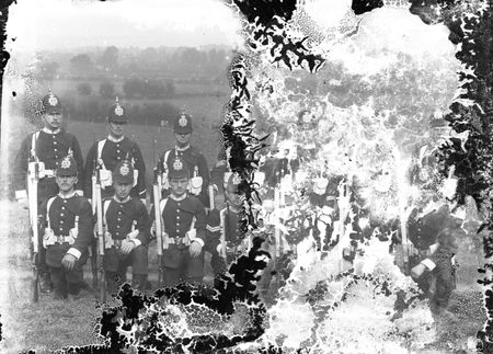 A damaged military print of soldiers of the North Staffordshire Regiment, presumably 'at camp' in Herefordshire