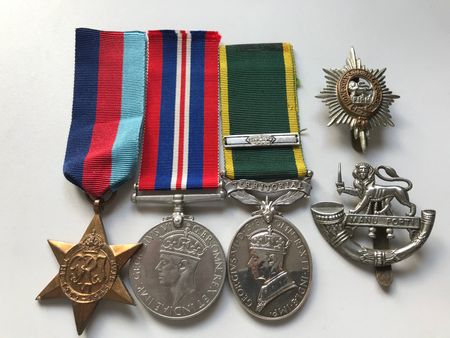 Bert Poole's Second World War Medals along with his Efficiency Medal and clasp.  He served with the 8th Worcestershire Regiment during the Battle of France and was taken prisoner before the fall of Dunkirk.