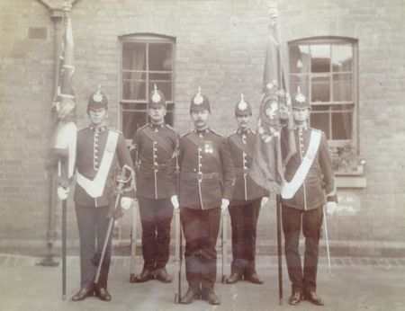 Capel carrying the King's Colour at the award of Colours to The Regiment at Windsor Castle in 1908.