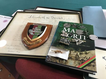 Bill brought in some items to show us, including his framed commissioning scroll and ID tags.