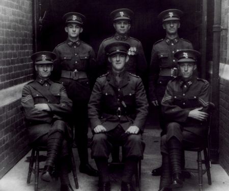 The Ledbury party:    Rear Row:        LCpl Ernie Beavan, Pte Joe Neale, Pte W Sturge. Front Row:       Sgt C Pritchard, Capt Wally Jukes, Cpl R Lancett.                                                                                            