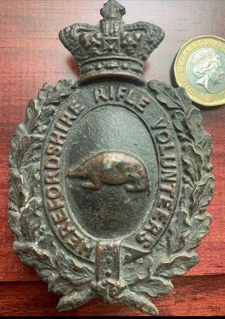 The Ross On Wye plate features a badger