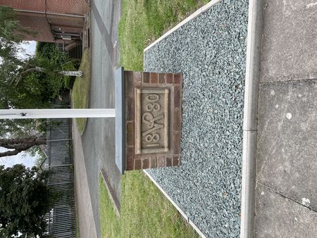 The date stone from above the Officers Mess door now installed outside the entrance to E Company's Drill Hall in the Army Reserve Centre