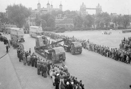 Civilian Rescue units pass along the Embankment