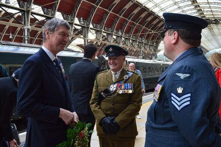 Andy Taylor and Danny Rees chatting to Vice Admiral Sir Tim Lawrence at Paddington Station.