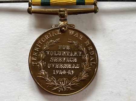 The reverse (back) of the Territorial Force War Medal, shwoing the rather misleading dates 1914-1919, as the qualifying date ended on 11th November 1918 and if a Territorial soldier had served in a theatre of war before 31st December 1915, they would not have qualified for this medal either!