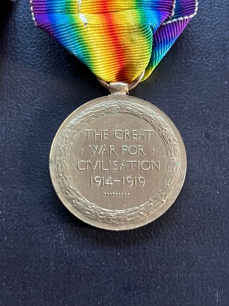 The reverse of the Victory Medal.  A medal issued to all British and Commonwealth troops who served overseas on the establishment of a unit.  Over 2000 were issued to men of the Herefordshire Regiment.