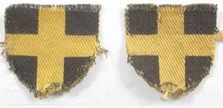 38 (Welsh) Div shoulder flash - the yellow cross of St David on a black shield