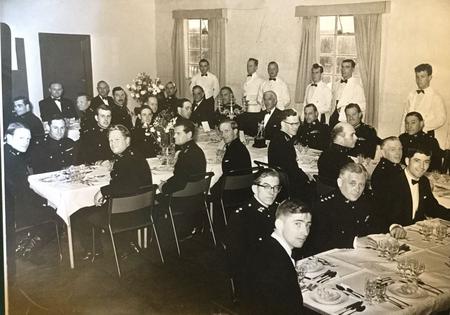 A Regimental Officers' Mess Dinner Night at Annual Camp (1960 or 61). Lt Col Tom Hill as CO with the Middle East soldier in front of him. On Col Hill's right is the Lord Lieutenant, Col J McLean (also Honorary Colonel) and on his left Maj Gen Musson. 