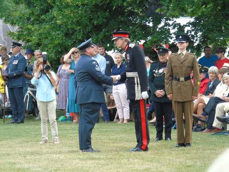 Assistant Curator, Danny Rees being awarded the Cadet Forces Medal from HM Lord Lieutenant, Mr Edward Harley OBE.
