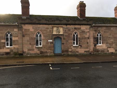 St Ethelberts Almshouses on a wet day on 2022