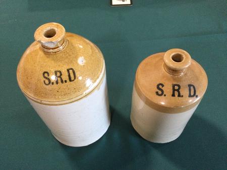 'SRD' Rum Jars or 'jordies', the larger hold one gallon the smaller one (sometimes known as an officers jar) half a gallon.