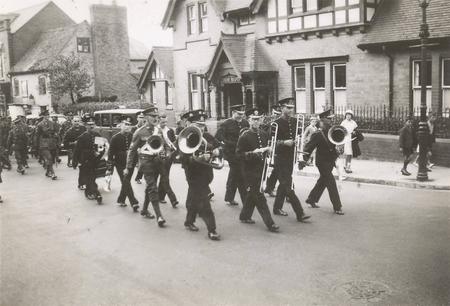 Harry Jessett marching with the Ledbury Town Band - the occasion is not known.