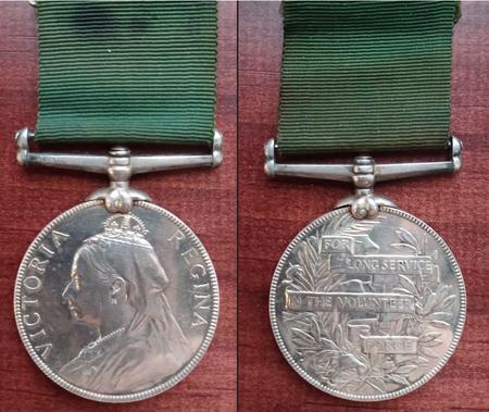 The Volunteer Force Long Service medal awarded for 20 years service with the Volunteers.  Two such medals mysteriously exist for Pte George Greenhouse of Leominster.